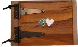 Small Hand Crafted Wooden Photo Album with two shell hearts in the middle of the cover